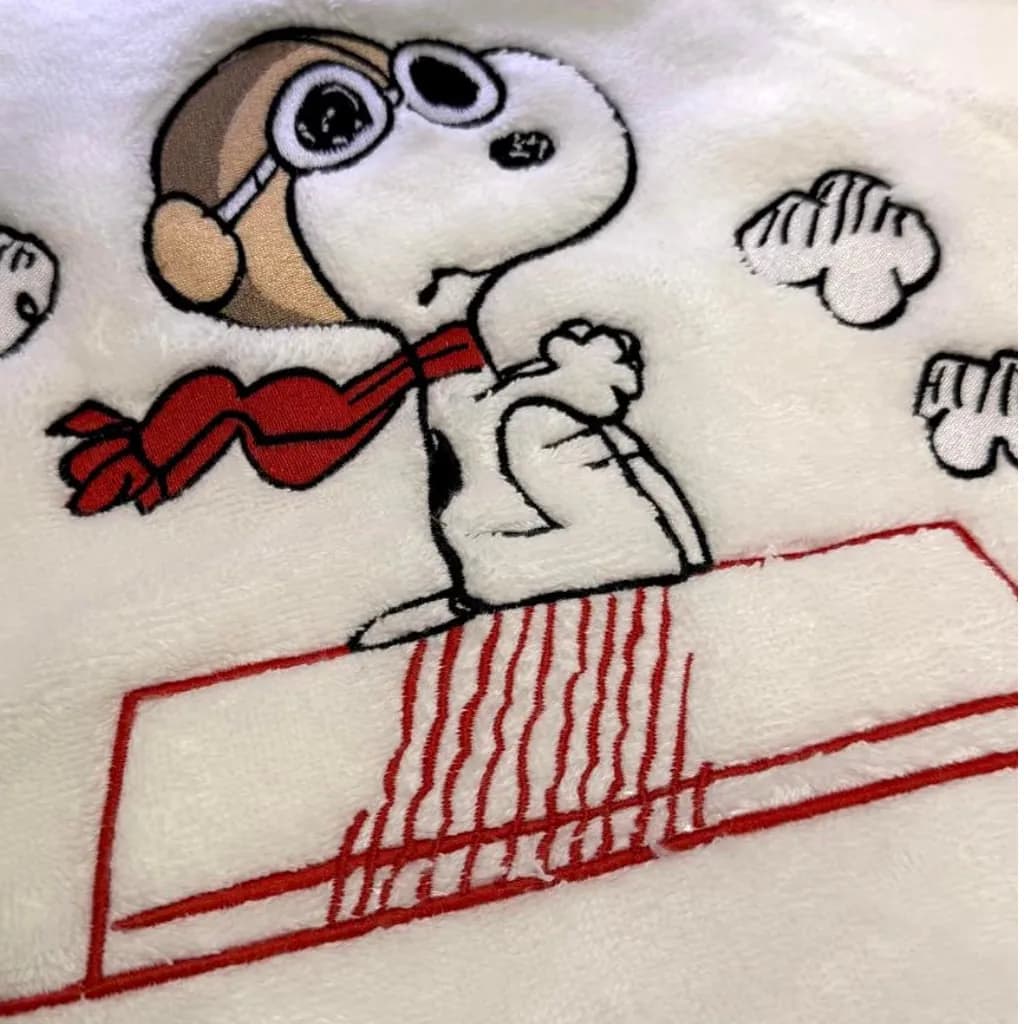 Broderie personnalisée Snoopy sur serviette
